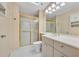 Bathroom with a shower, neutral wall color, and white cabinets at 264 Balfour Dr, Winter Park, FL 32792