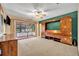 Bedroom features include a ceiling fan, built-in cabinet, and access to the screened-in patio at 264 Balfour Dr, Winter Park, FL 32792