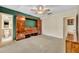 Bedroom features include a ceiling fan, built-in cabinet, and ensuite bathroom at 264 Balfour Dr, Winter Park, FL 32792
