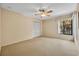 Bedroom with neutral walls, blinds, and closet at 264 Balfour Dr, Winter Park, FL 32792