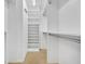 Walk-in closet with shelving and closet rods for optimal organization at 264 Balfour Dr, Winter Park, FL 32792