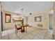 Bright dining area features tile flooring and a stylish pendant light fixture above the round table at 264 Balfour Dr, Winter Park, FL 32792