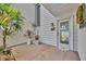 Inviting entrance featuring potted plants, decorative accents, and a welcoming door at 264 Balfour Dr, Winter Park, FL 32792
