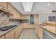 Gourmet kitchen showcasing stainless steel appliances and ample cabinet space at 264 Balfour Dr, Winter Park, FL 32792
