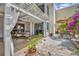 Charming patio with pergola, dining area, and views of lush landscaping at 264 Balfour Dr, Winter Park, FL 32792
