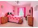 Bedroom featuring a bed, window, dresser, and a ceiling fan at 2781 Almaton Loop # 404, Kissimmee, FL 34747