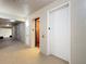 Condo hallway featuring elevator and neutral decor, providing easy access to all units at 2781 Almaton Loop # 404, Kissimmee, FL 34747
