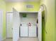 Convenient laundry closet with washer and dryer units for in-home laundry convenience at 2781 Almaton Loop # 404, Kissimmee, FL 34747