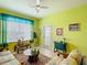 Cozy and bright living room with bright walls and modern furnishings at 2781 Almaton Loop # 404, Kissimmee, FL 34747
