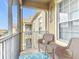 Relaxing outdoor patio with comfortable seating and views of the surrounding neighborhood at 2781 Almaton Loop # 404, Kissimmee, FL 34747