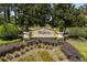 Elegant Windsor Hills community signage surrounded by meticulously maintained landscaping at 2781 Almaton Loop # 404, Kissimmee, FL 34747