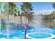 Entertaining splash park with interactive water features and sprayers for play at 2781 Almaton Loop # 404, Kissimmee, FL 34747