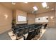 Comfortable theater room with tiered seating, a large screen, and ambient lighting for movie nights at 2781 Almaton Loop # 404, Kissimmee, FL 34747