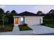 Charming single-story home with a two-car garage and well-manicured lawn at 2791 San Marco Way, Winter Haven, FL 33884