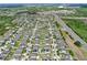 An aerial view shows the community's convenient access to the highway at 299 Whirlaway Dr, Davenport, FL 33837