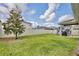 Large backyard with play area and fencing for privacy at 299 Whirlaway Dr, Davenport, FL 33837
