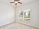 Bedroom features a window bringing natural light into the space at 299 Whirlaway Dr, Davenport, FL 33837