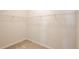 Walk-in closet features wire shelving for optimal storage at 299 Whirlaway Dr, Davenport, FL 33837