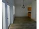 Dining room featuring tile floors, modern light fixture and french doors at 3144 Ginger Cir, Orlando, FL 32826