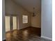 Dining room featuring tile floors, modern light fixture and french doors at 3144 Ginger Cir, Orlando, FL 32826