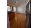 Well-lit kitchen with dark countertops and wooden cabinets at 3144 Ginger Cir, Orlando, FL 32826