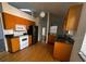 Well-lit kitchen with ample cabinet space, tile floors, and modern appliances at 3144 Ginger Cir, Orlando, FL 32826