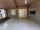 Enclosed patio with tile floor and French doors leading outside at 3144 Ginger Cir, Orlando, FL 32826