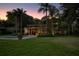 Expansive backyard featuring a sparkling pool and lush green lawn at 320 Mary Jess Rd, Orlando, FL 32839