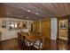 Bright dining room featuring a wood dining table, brick floors, and views to other rooms in the house at 320 Mary Jess Rd, Orlando, FL 32839