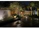 Charming home exterior with stone accents and artful landscape lighting creating curb appeal at 320 Mary Jess Rd, Orlando, FL 32839