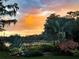 Beautiful lake view with lush landscaping at 320 Mary Jess Rd, Orlando, FL 32839