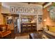 A cozy space, showcasing the living area's decor, kitchen bar and comfortable seating at 320 Mary Jess Rd, Orlando, FL 32839