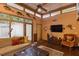 Bright living room offering unique decor, brick floors and natural light at 320 Mary Jess Rd, Orlando, FL 32839