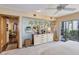 Spacious primary bedroom with adjacent bathroom and backyard view at 320 Mary Jess Rd, Orlando, FL 32839