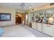 Bright primary bedroom showcasing natural light and adjacent ensuite bathroom at 320 Mary Jess Rd, Orlando, FL 32839