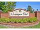 Beautiful brick sign for Benington Club with manicured landscaping at 353 Meadow Beauty Ter, Sanford, FL 32771