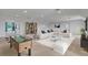 Finished basement with a foosball table, bookshelf, L-shaped couch and recessed lighting at 3550 Kaiser Ave, St Cloud, FL 34772
