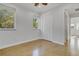 Neutral bedroom with double closet and two windows at 3550 Kaiser Ave, St Cloud, FL 34772