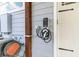 Electric car charging station installed on exterior wall, highlighting modern convenience and sustainability at 3550 Kaiser Ave, St Cloud, FL 34772