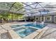 A screened-in pool and hot tub area perfect for outdoor relaxation and entertainment at 3550 Kaiser Ave, St Cloud, FL 34772