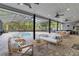 Outdoor living featuring covered patio with in ground pool, dining and living areas at 3550 Kaiser Ave, St Cloud, FL 34772