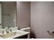 Bathroom with neutral-colored walls, a toilet, and vanity with granite counters at 369 James Cir, Lake Alfred, FL 33850