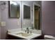 Bathroom with neutral-colored walls, a toilet, and vanity with granite counters and a custom faucet at 369 James Cir, Lake Alfred, FL 33850