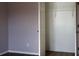 Bedroom with neutral-colored walls and an open closet with shelving at 369 James Cir, Lake Alfred, FL 33850