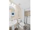 Bathroom with pedestal sink, elongated toilet, and a laundry area with a washer and dryer at 380 Carina Cir, Sanford, FL 32773
