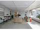 Covered patio with comfortable seating creating an ideal outdoor living space at 4025 Luan Dr, Orlando, FL 32808