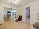 Room with barber chairs and mirrors, suitable for a salon or home office setup with tile flooring at 4025 Luan Dr, Orlando, FL 32808