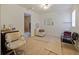Versatile room with barber chairs and mirrors, suitable for a salon or home office setup at 4025 Luan Dr, Orlando, FL 32808