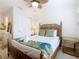 Cozy bedroom features a queen bed, ceiling fan, and ample closet space at 4098 Lana Ave, Davenport, FL 33897