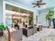 Charming patio with comfortable seating, ideal for outdoor entertaining and relaxation at 4098 Lana Ave, Davenport, FL 33897